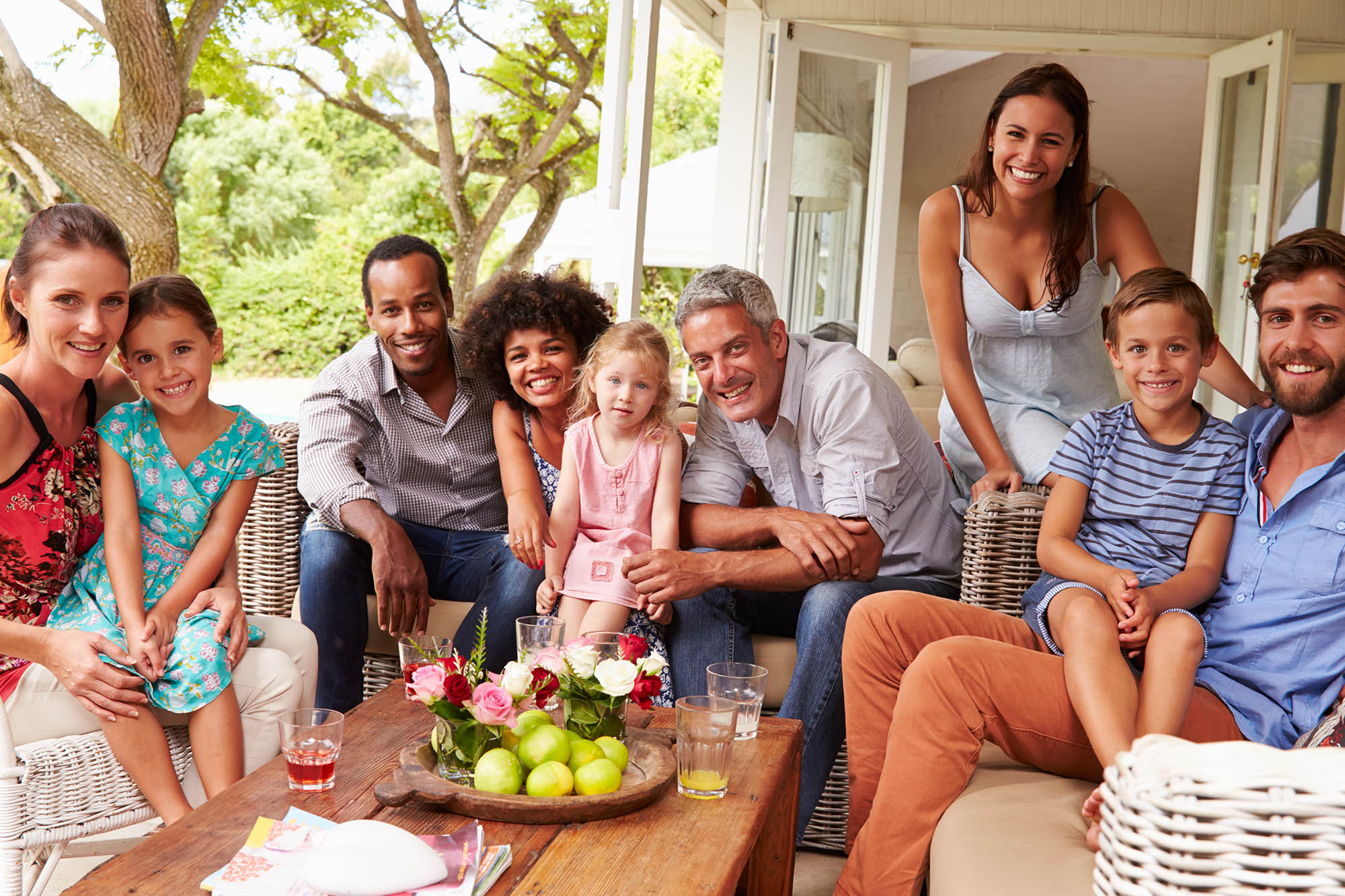 Family and friends posing for a pictur.